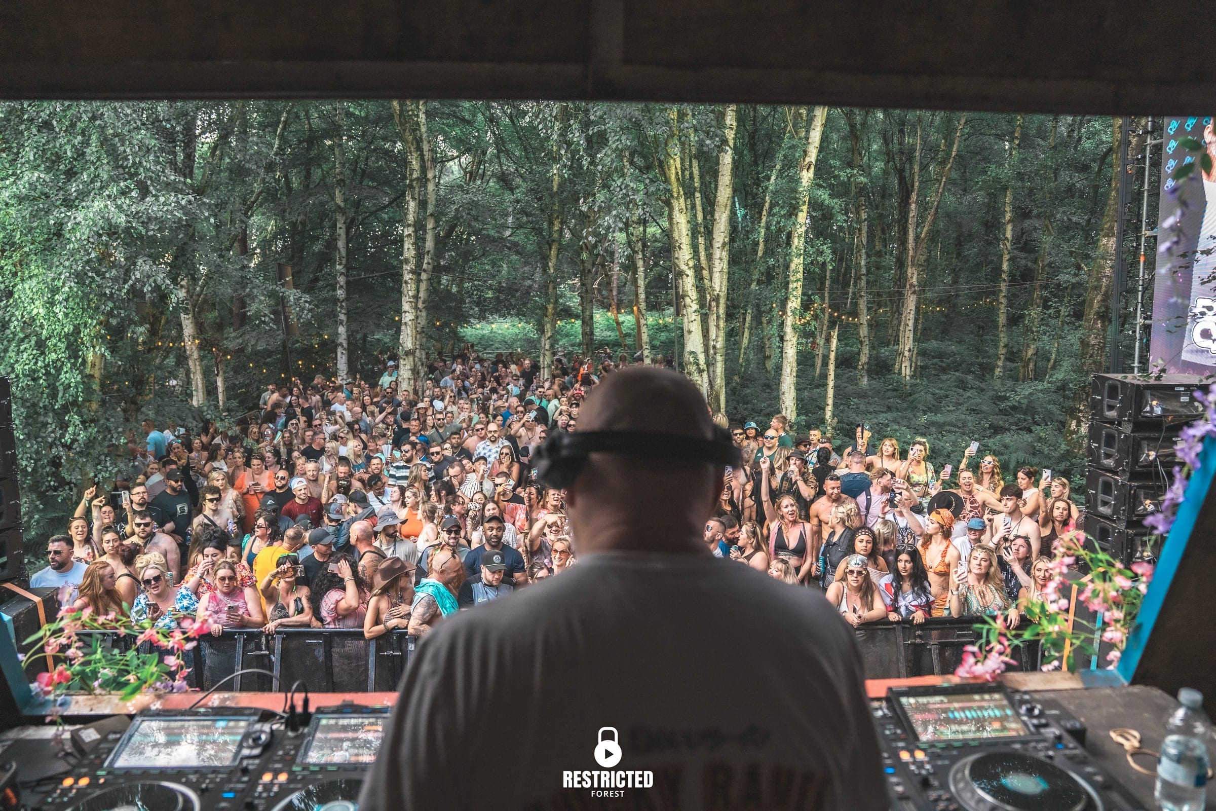 From behind the decks on the BNCY Pyramid Stage, the crowd filling the forest clearing