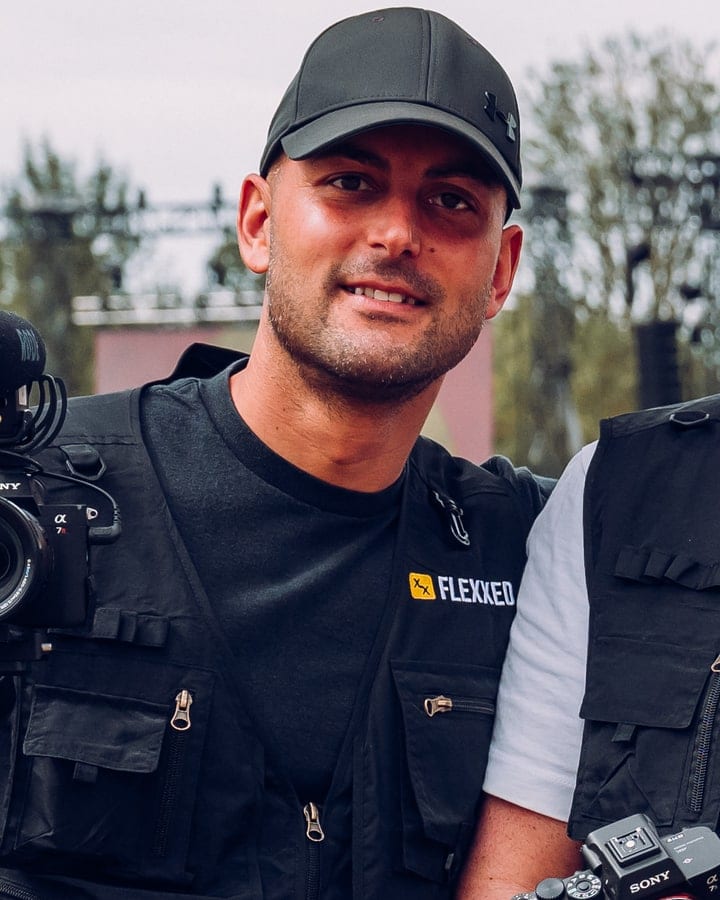 VJ at Reggae Land in a Flexxed vest, camera rig at his side